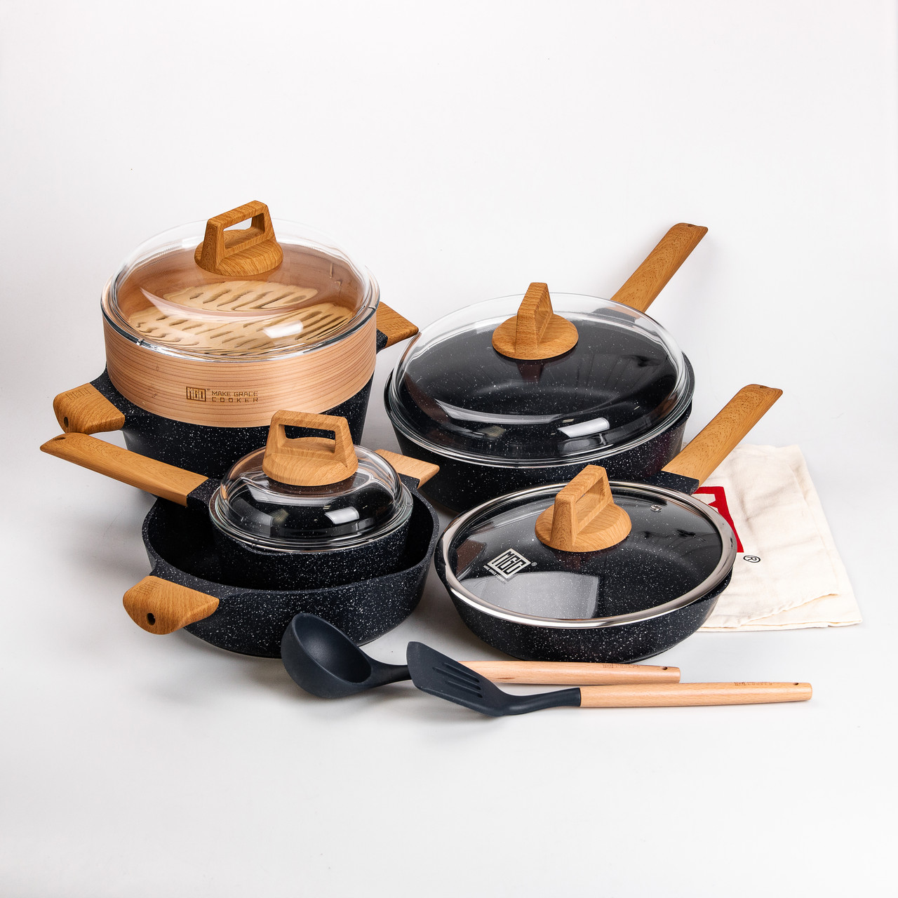 Набір посуду MGC 2 каструлі, 2 сковороди, сотейник, пароварка, ополоник, лопатка, фартух