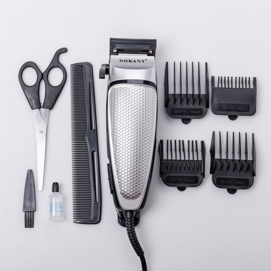 Машинка для стрижки волосся електрична 10 Вт універсальна 4 насадки Срібляста Sokany