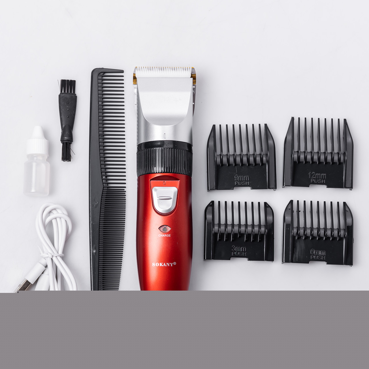 Машинка для стрижки волосся Sokany 4 насадки на акумуляторі