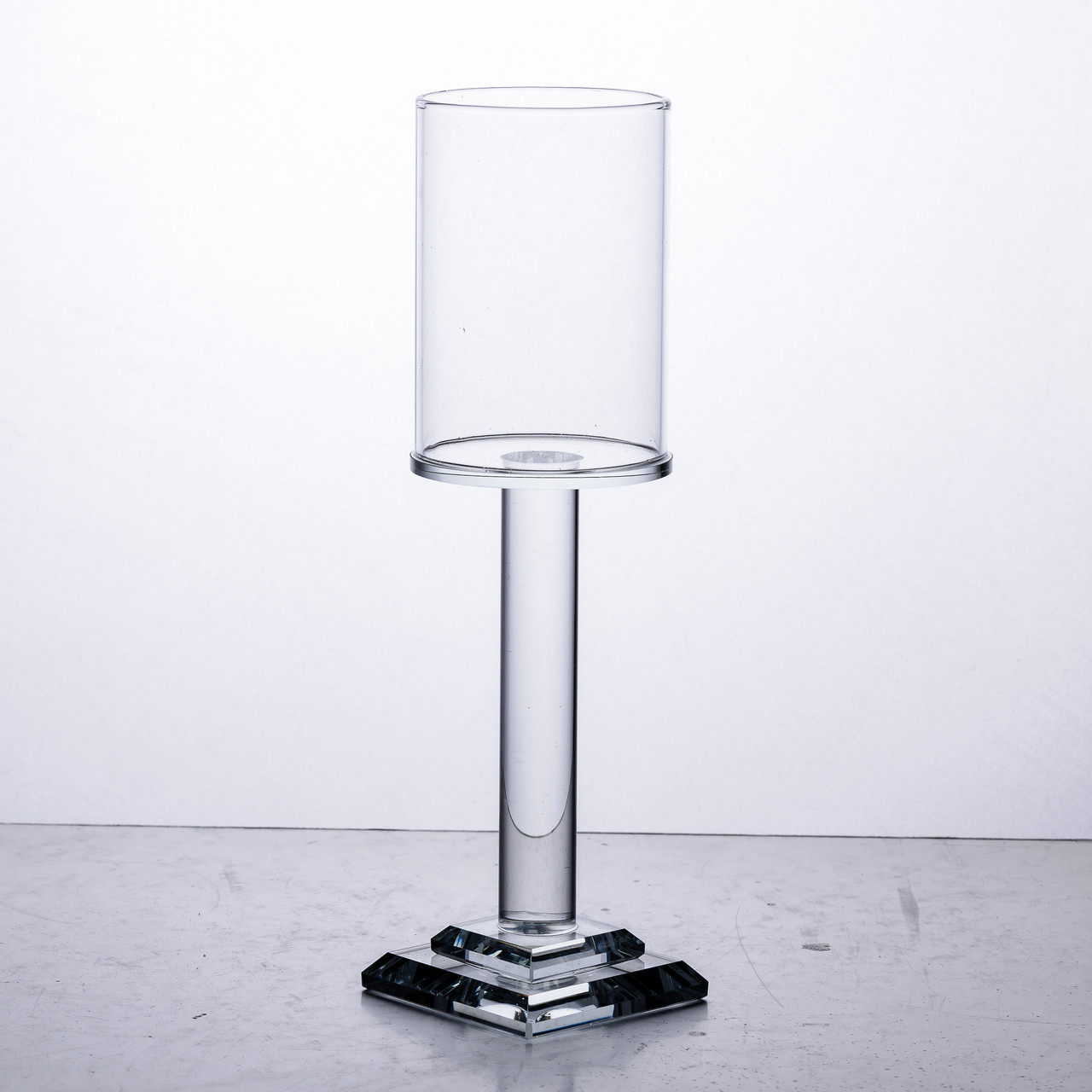 Підсвічник скляний на ніжці 6.5×23 см підсвічник келих декоративний прозорий