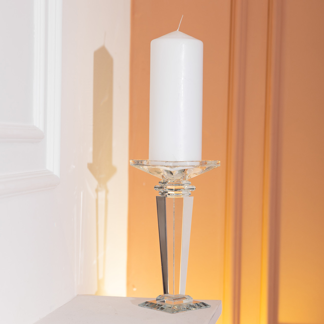 Підсвічник скляний на високій ніжці 9.5×9.5×22.5 см декоративний прозорий